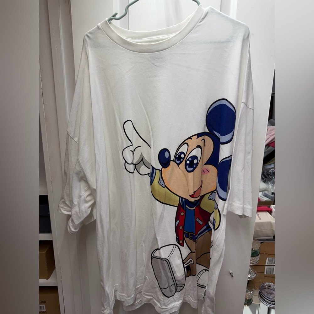 Tommy Hilfiger White Tee with Classic Flag Patch and Colorful Cartoon Print
